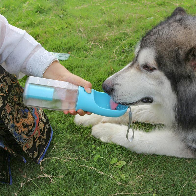 The Ultimate Pet Travel Buddy: Water, Food, Waste - All in One Bottle!